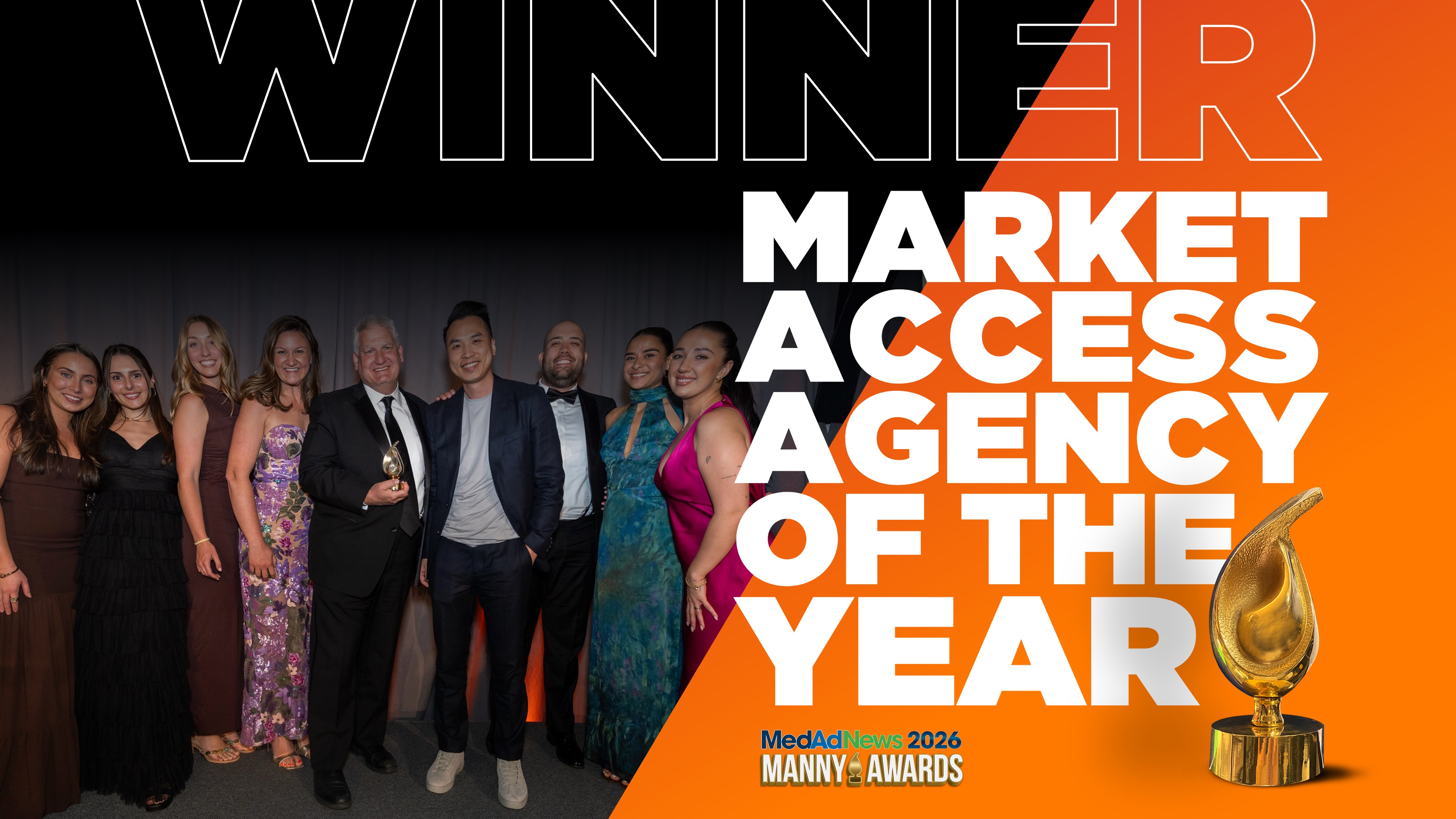 The Value Builder team standing on stage accepting the award for Market Access Agency of the Year, from the MANNYS The Value Builder team standing on stage accepting the award for Market Access Agency of the Year, from the MANNYS